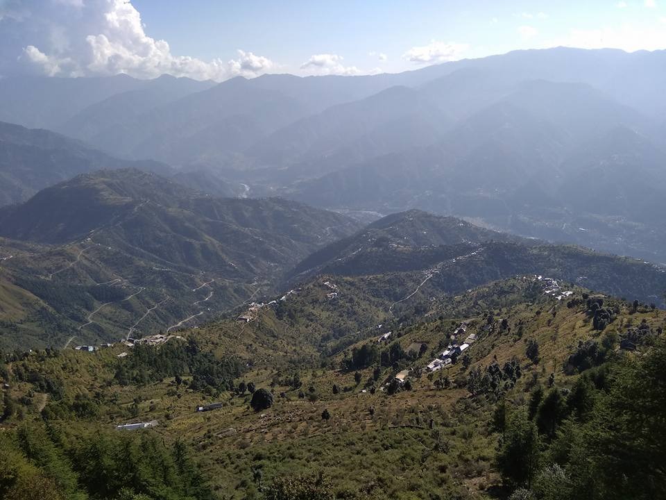 Sweeping panorama of Dwat Mahadev Valley with hamlets nestled between Pir Panjal ridgelines, Chamba Himalayas