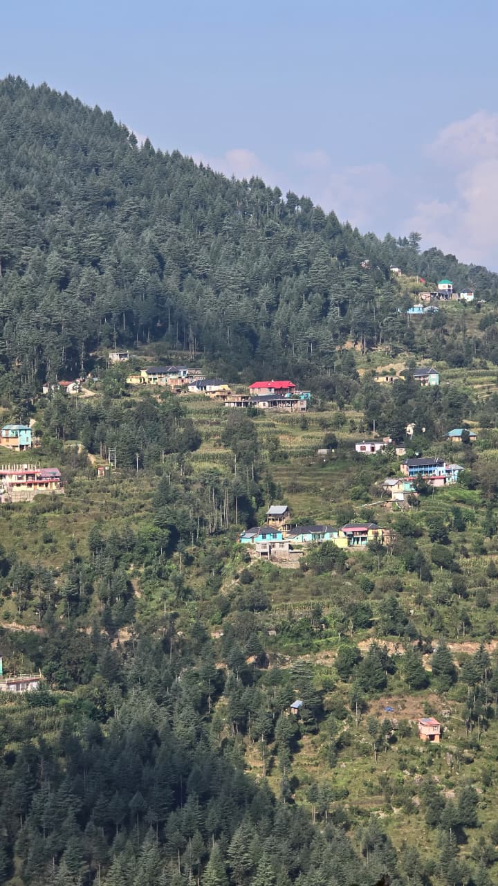 Terraced fields and traditional Gaddi settlement on the hillside — Dwat Mahadev Valley, Chamba
