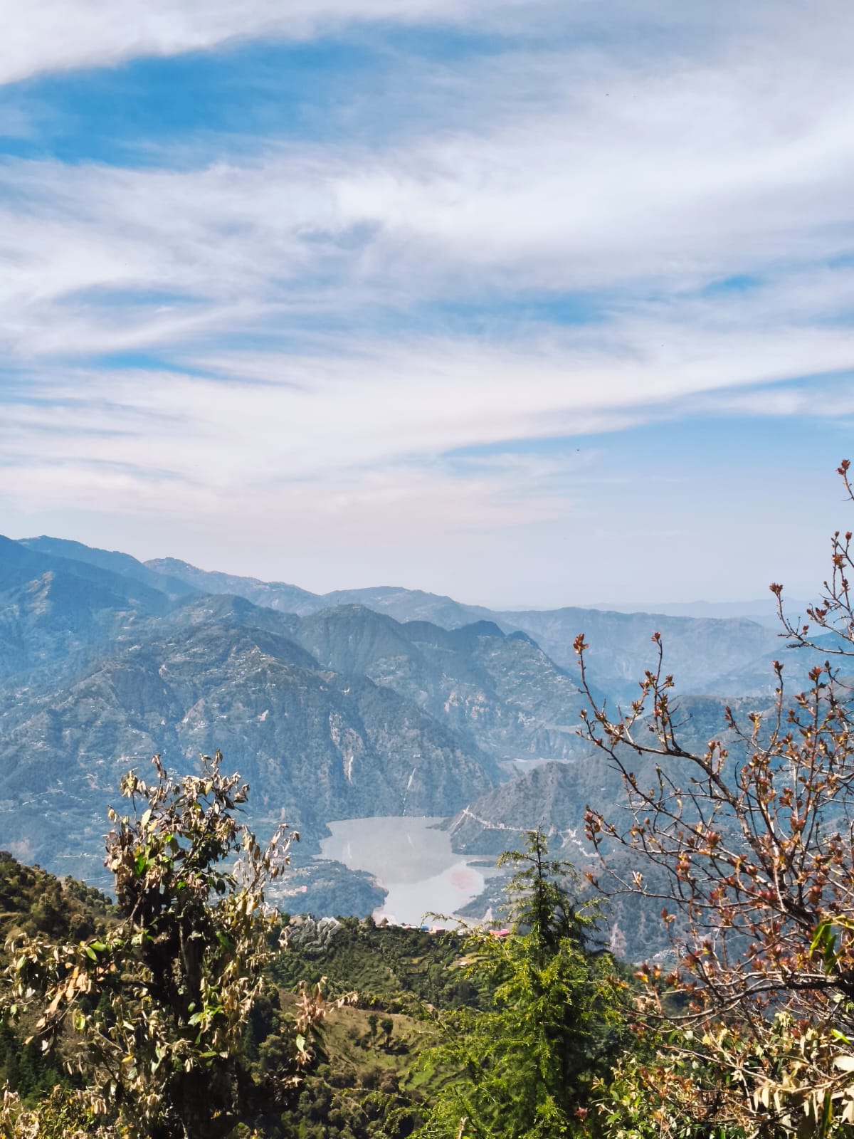Distant Himalayan lake seen from upper trails of Dwat Mahadev Valley