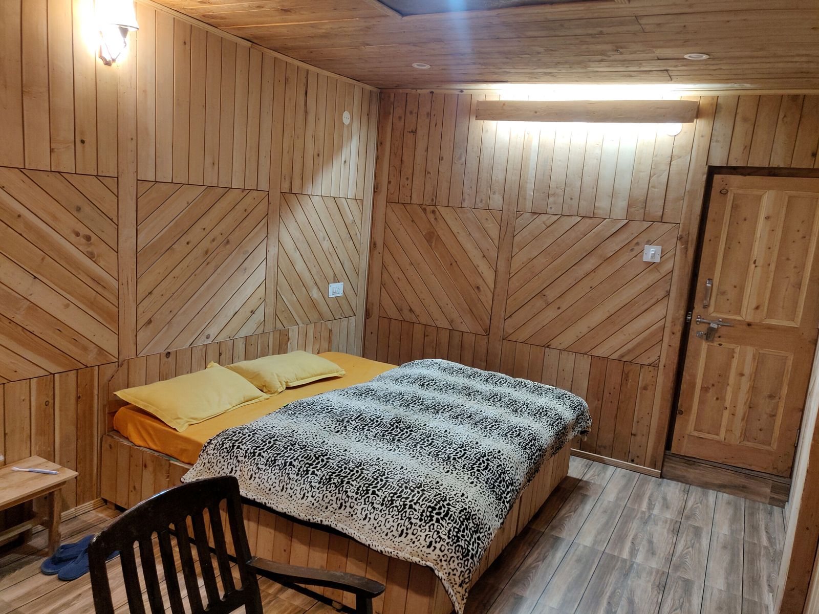 Bhaloli Mystic Village — luxury Gaddi community homestay on the edge of Kalatop Sanctuary, Chamba Himalayas